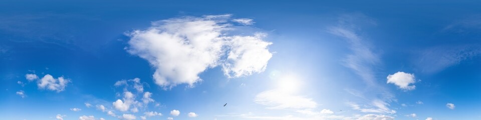 Sky 360 panorama - Bright blue sky filled with fluffy white Cumulus clouds. Seamless hdr spherical...