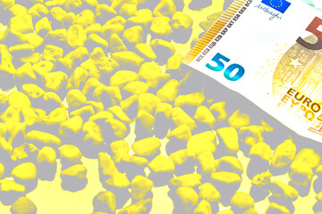 Paper currency. 50 euro banknote on light gold yellow stones