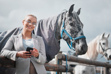 Portrait, phone and happy woman at horse farm outdoor with jockey in glasses for social media....