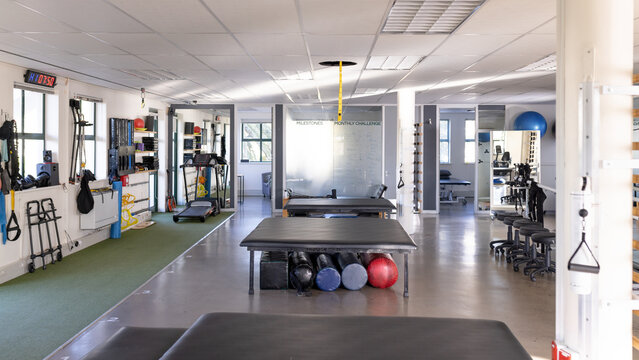 Gym rehabilitation center with various exercise equipment