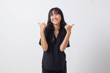 Portrait of attractive Asian woman in casual shirt making thumb up hand gesture, saying good job. Businesswoman concept. Isolated image on white background