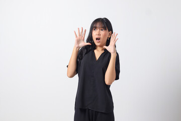 Portrait of attractive Asian woman in casual shirt shouting to the distance, announcing discount and promotion. Businesswoman concept. Isolated image on white background