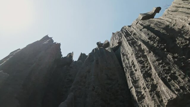 High grey karst limestone cliffs with steep furrowed slopes. Close-up. Tsingy De Bemaraha, Madagascar (4K)
