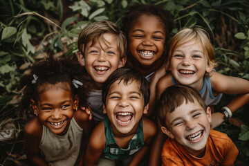 Fototapeta premium A group of children are smiling and hugging each other