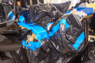 Individual is performing maintenance on the vehicles dashboard