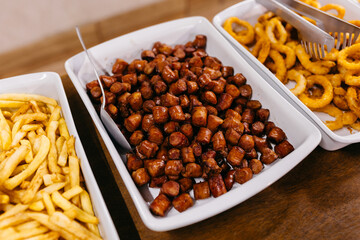 Close-up of assorted snacks served on plates for a banquet event
