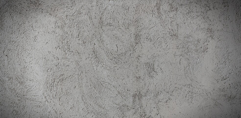 Grey textured concrete wall. Background are texture