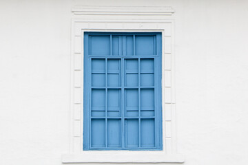 Blue window with shutters