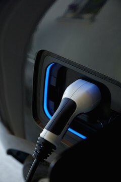 Electric Car Charging, Close-up View
