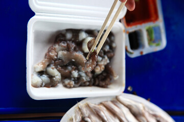 View of the small octopus sashimi on the dish