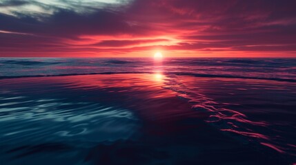 Obraz premium Calming image of the sun setting over a tranquil ocean, with reflections of rich pink and red hues on undulating water surfaces.