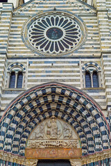 Details at facade of Genoa Cathedral or Metropolitan Cathedral of Saint Lawrence in Genoa, Italy.