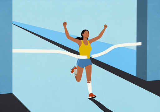 Female runner crossing finish line with arms raised
