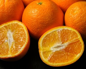 oranges on a black background