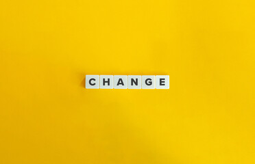 Change Word. Text on Block Letter Tiles on Flat Background. Minimalist Aesthetics.
