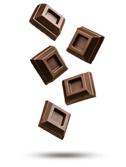 Dark chocolate blocks falling on white background.