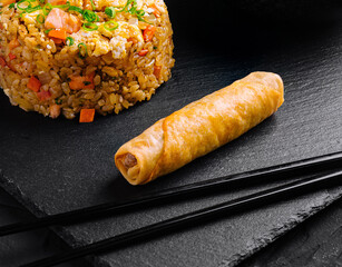 Asian cuisine delight: fried rice and spring roll