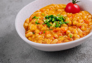Homemade spicy chickpea stew with garnish