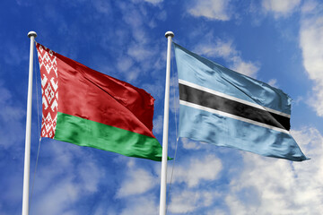 3d illustration. Belarus and Botswana Flag waving in sky. High detailed waving flag. 3D render. Waving in sky. Flags fluttered in the cloudy sky.