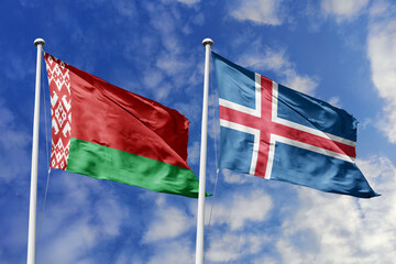 3d illustration. Belarus and Iceland Flag waving in sky. High detailed waving flag. 3D render. Waving in sky. Flags fluttered in the cloudy sky.