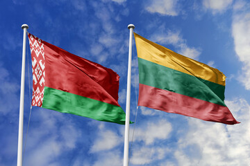 3d illustration. Belarus and Lithuania Flag waving in sky. High detailed waving flag. 3D render. Waving in sky. Flags fluttered in the cloudy sky.