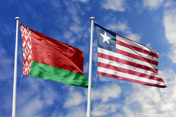 3d illustration. Belarus and Liberia Flag waving in sky. High detailed waving flag. 3D render. Waving in sky. Flags fluttered in the cloudy sky.