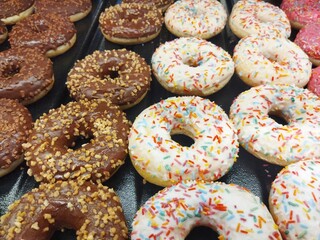 Sweet donuts, glazed buns, baked goods