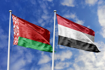 3d illustration. Belarus and Yemen Flag waving in sky. High detailed waving flag. 3D render. Waving in sky. Flags fluttered in the cloudy sky.