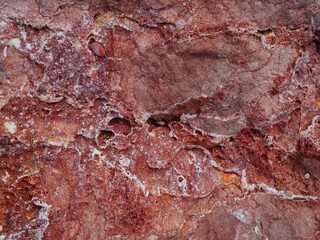 closeup rough texture of stone surface with salt deposits, natural abstract background