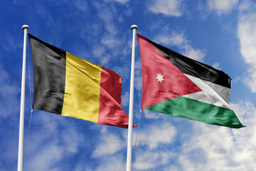 3d illustration. Belgium and JordanFlag waving in sky. High detailed waving flag. 3D render. Waving in sky. Flags fluttered in the cloudy sky.
