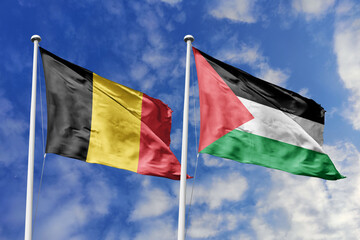 3d illustration. Belgium and Palestine Flag waving in sky. High detailed waving flag. 3D render. Waving in sky. Flags fluttered in the cloudy sky.