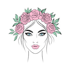 Portrait of a young woman with a flower wreath on her head.