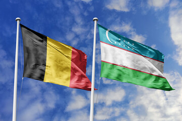 3d illustration. Belgium and Uzbekistan Flag waving in sky. High detailed waving flag. 3D render. Waving in sky. Flags fluttered in the cloudy sky.