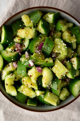 Homemade Smashed Cucumber Salad in a Bowl, top view.