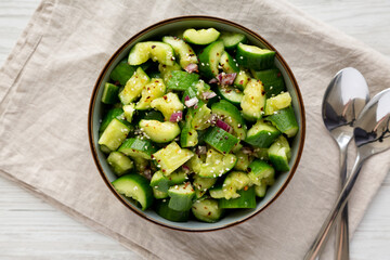 Homemade Smashed Cucumber Salad in a Bowl, top view.