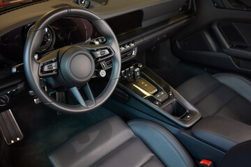 Vehicle with seating and steering wheel, interior design
