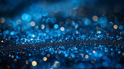 A mesmerizing abstract background featuring a pattern of blue bokeh lights with varying intensities