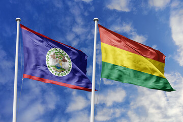 3d illustration. Belize and Bolivia Flag waving in sky. High detailed waving flag. 3D render....