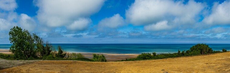 Historic Omaha Beach in Normandy as viewed from the American Cemetery