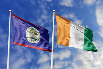 3d illustration. Belize and Ivory Coast Flag waving in sky. High detailed waving flag. 3D render....