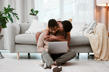 Couple, hug and laptop in house living room on sofa for remote work, email or digital planning with...
