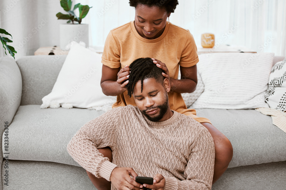 Canvas Prints Couple, black woman and man in living room, phone and together for love, smile and romance in home to relax. House, African person and partner in lounge, touch and happy for marriage and commitment