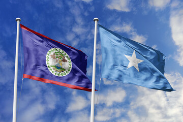 3d illustration. Belize and Somalia Flag waving in sky. High detailed waving flag. 3D render....