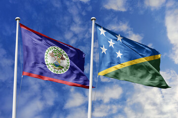 3d illustration. Belize and Solomon Islands Flag waving in sky. High detailed waving flag. 3D...