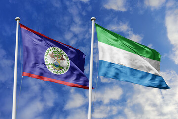 3d illustration. Belize and Sierra Leone Flag waving in sky. High detailed waving flag. 3D render....