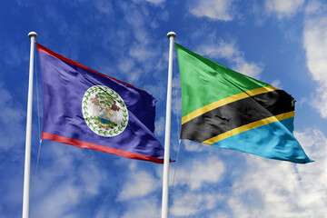 3d illustration. Belize and Tanzania Flag waving in sky. High detailed waving flag. 3D render....