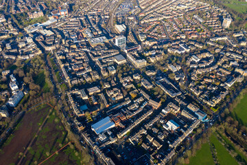 Aerial photo of the town centre of Harrogate in the UK showing a muddy playing field known as the...