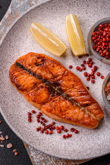 Fresh cooked delicious salmon steak with spices and herbs
