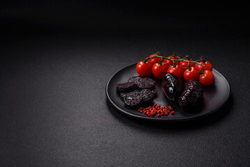 Delicious black blood sausage or black pudding with spices