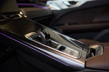 Naklejka premium Macro shot of a car gear lever an essential auto part